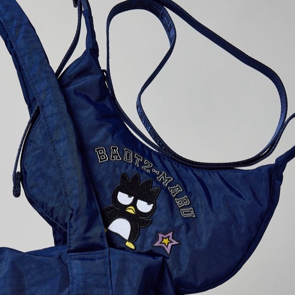 BAGGU X Hello Kitty And Friends UO Exclusive
Badtz-Maru Small Nylon Crescent Bag - Picture 1 of 4